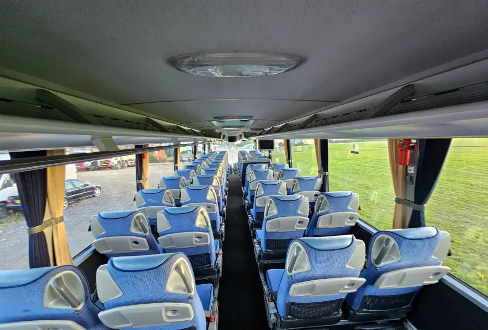 Spacious 55 seater coach interior for group transportation